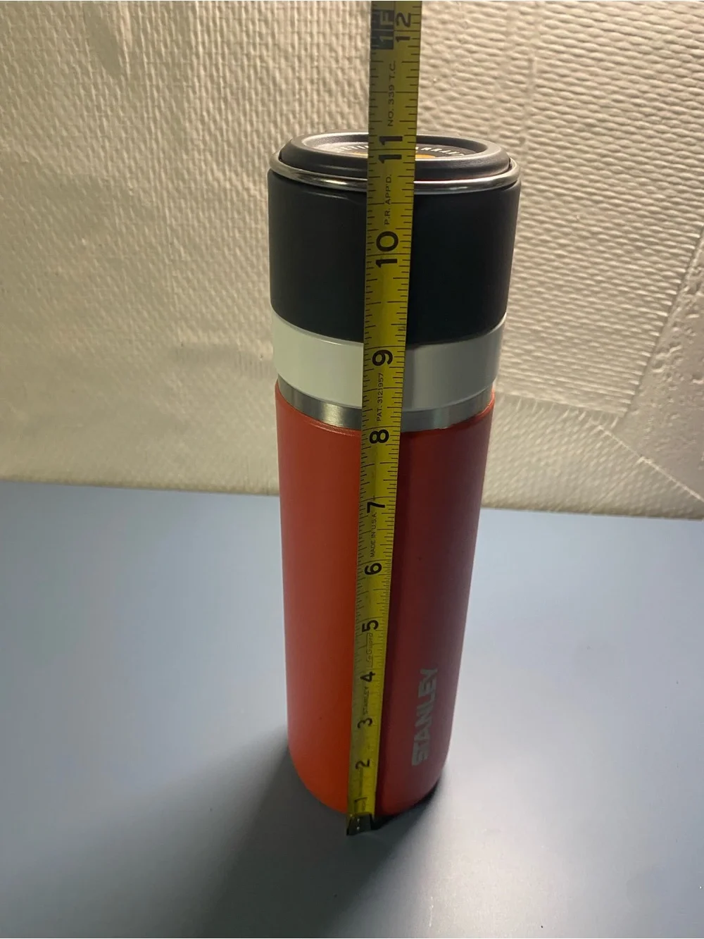 Stanley Orange Tumbler with Black Lid and White Band
